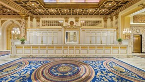 A grand lobby with a marble floor, ornate ceiling, and a large chandelier. - Fairmont Copley Plaza, Boston (Boston)