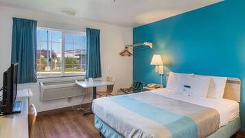 Desk, laptop workspace, free WiFi, bed sheets