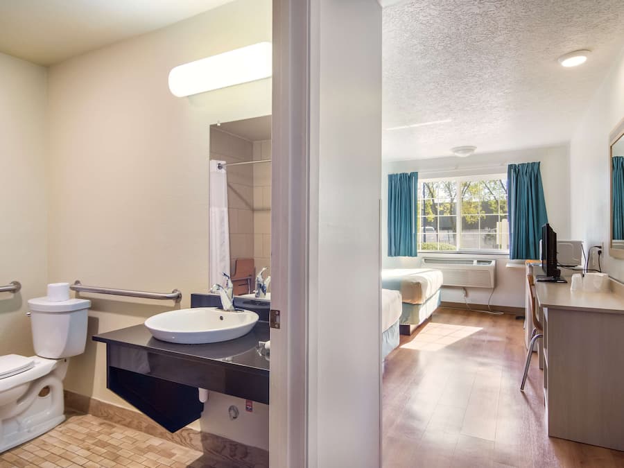 Desk, laptop workspace, free WiFi, bed sheets