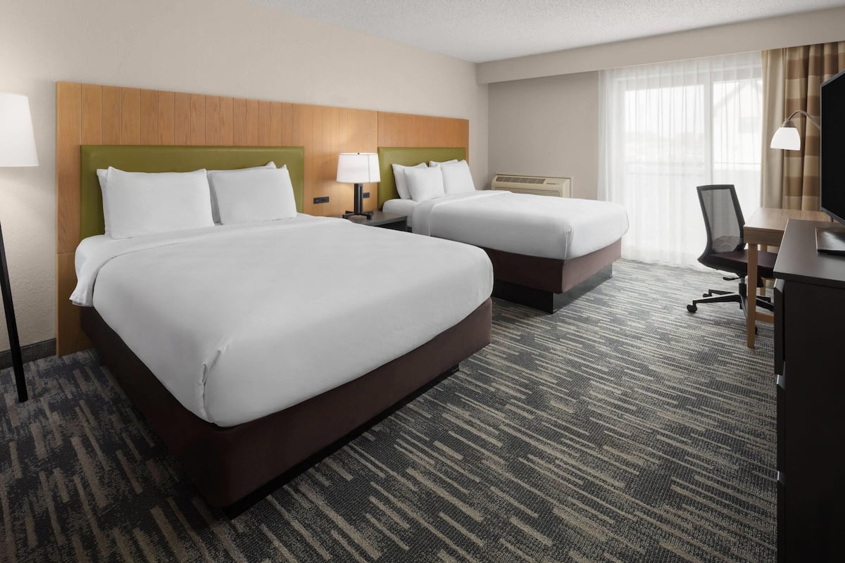 Deluxe Room, 2 Double Beds, Non Smoking, Balcony | Egyptian cotton sheets, premium bedding, pillowtop beds, desk