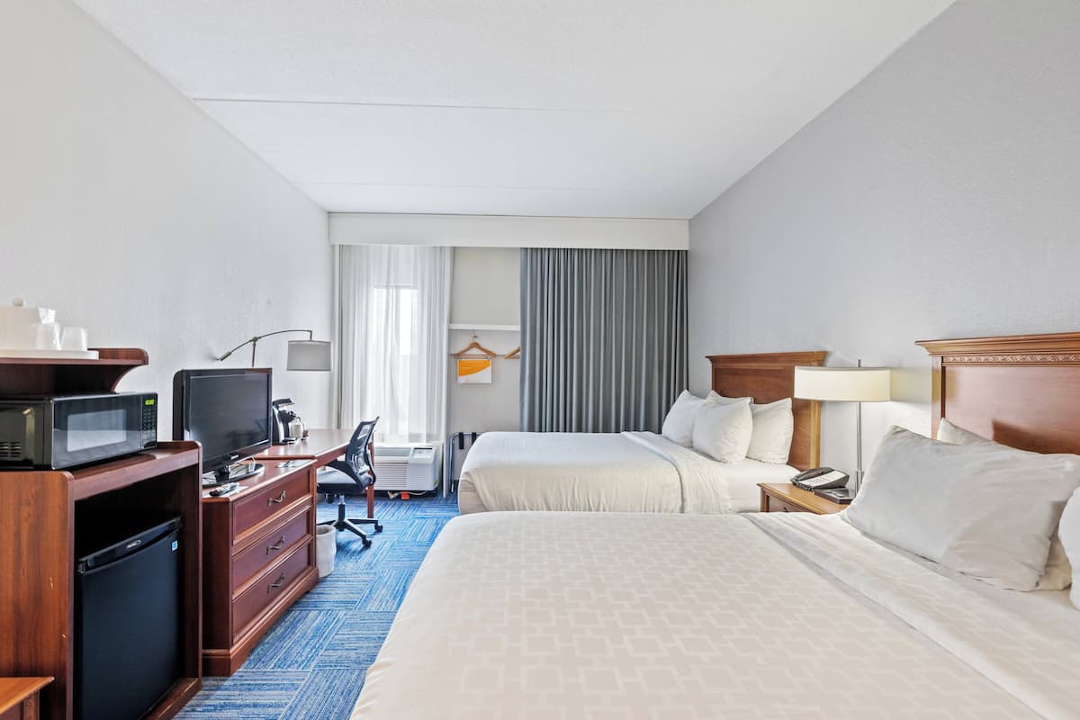 Deluxe Room, 2 Queen Beds, Non Smoking | Premium bedding, down duvets, individually furnished, desk