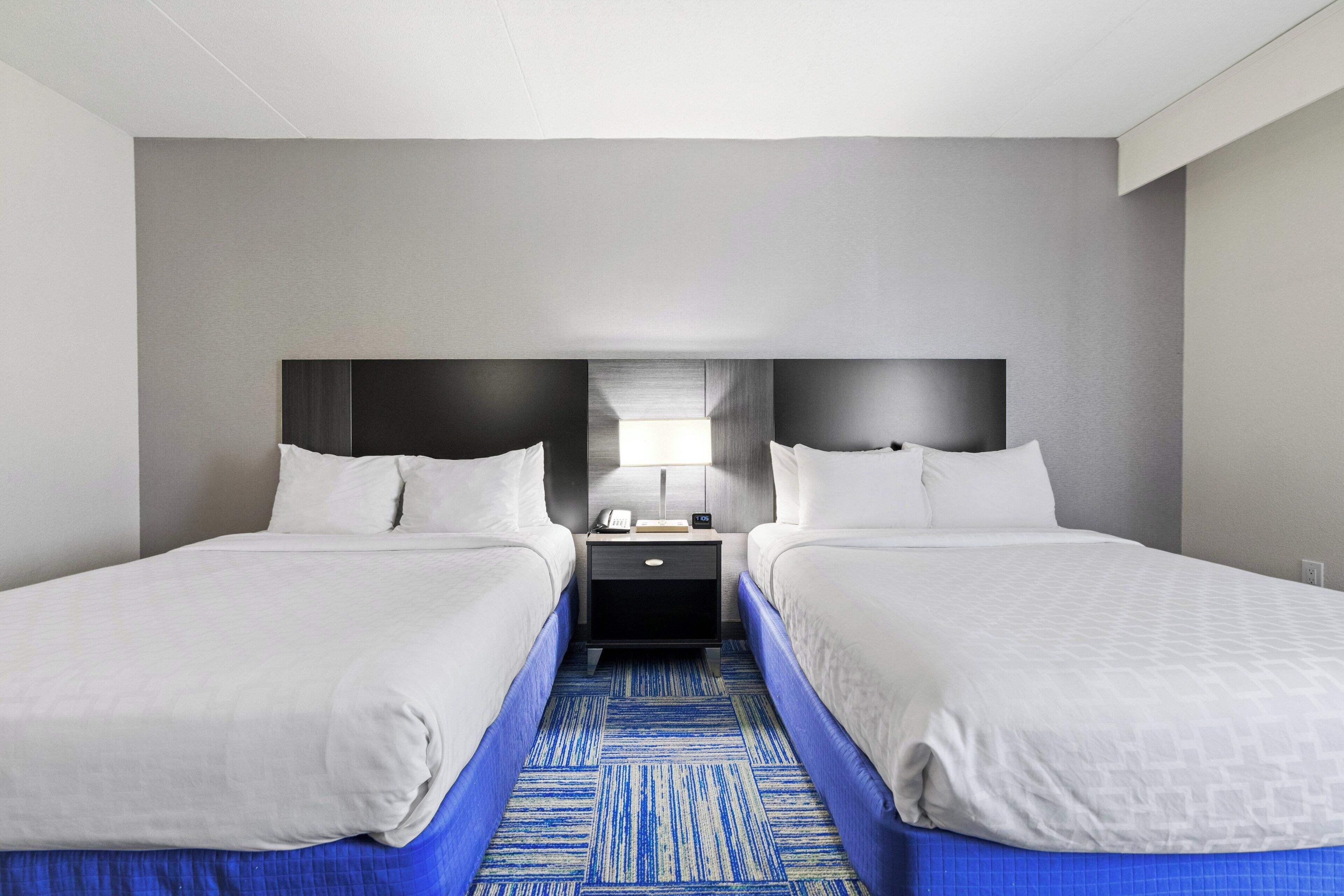 superior room, 2 queen beds, non smoking | premium bedding, down duvets, individually furnished, desk