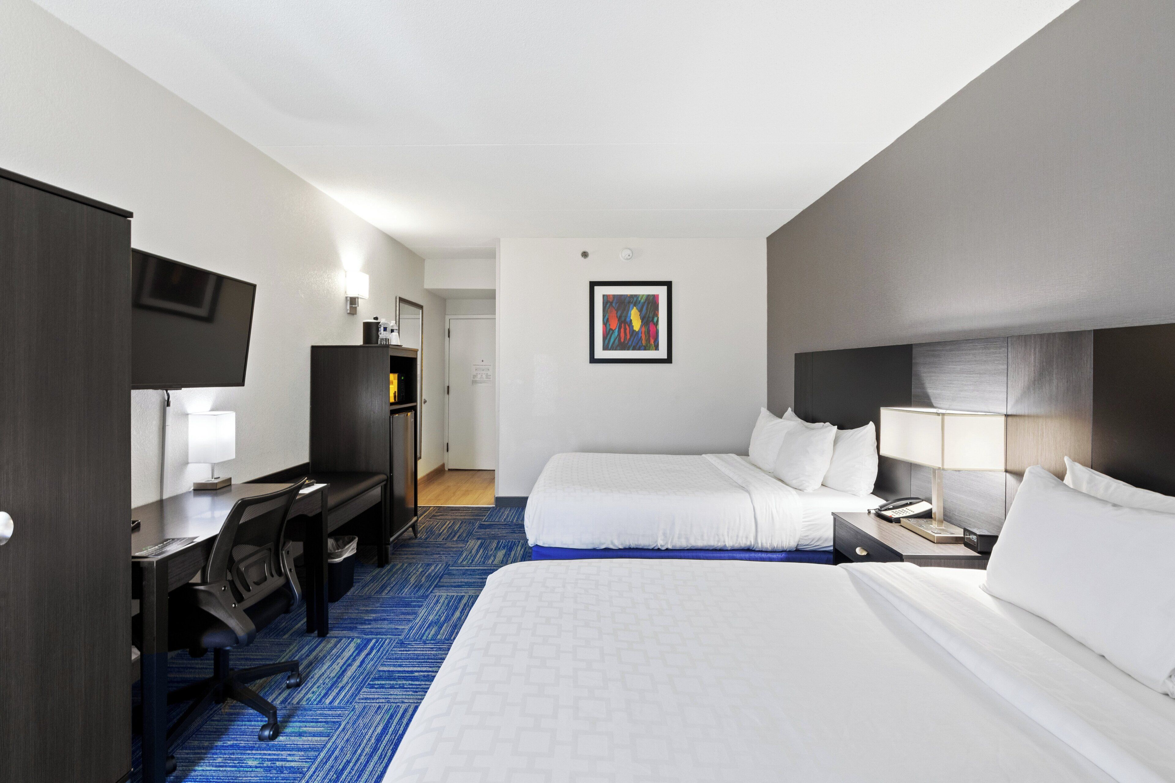 superior room, 2 queen beds, non smoking | premium bedding, down duvets, individually furnished, desk