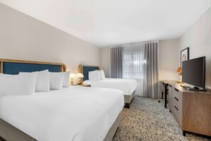 Suite, varias camas (Two Bedroom King and Two Doubles) | Sábanas de algodón egipcio y ropa de cama de alta calidad