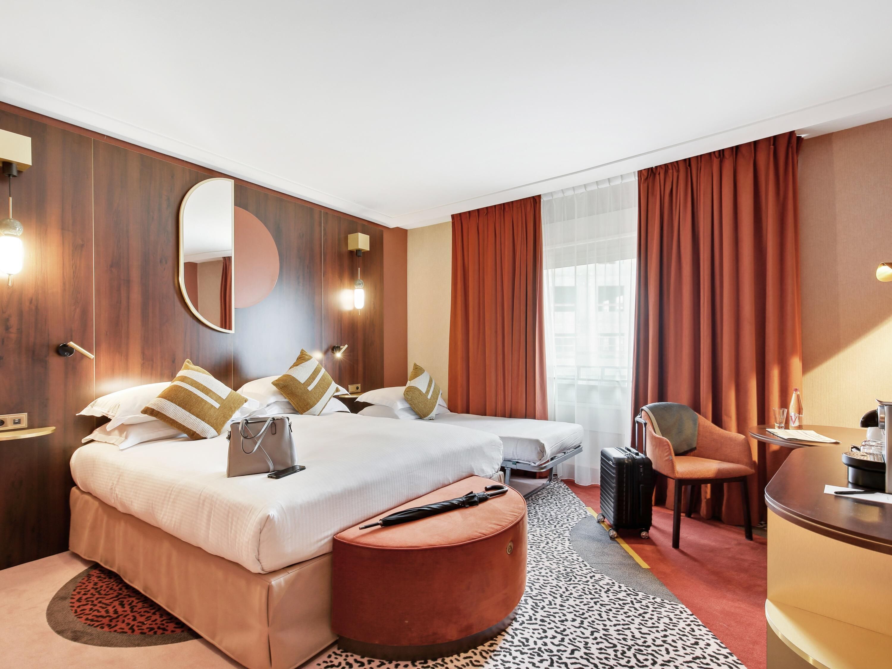 Premium bedding, pillow-top beds, free minibar items, in-room safe