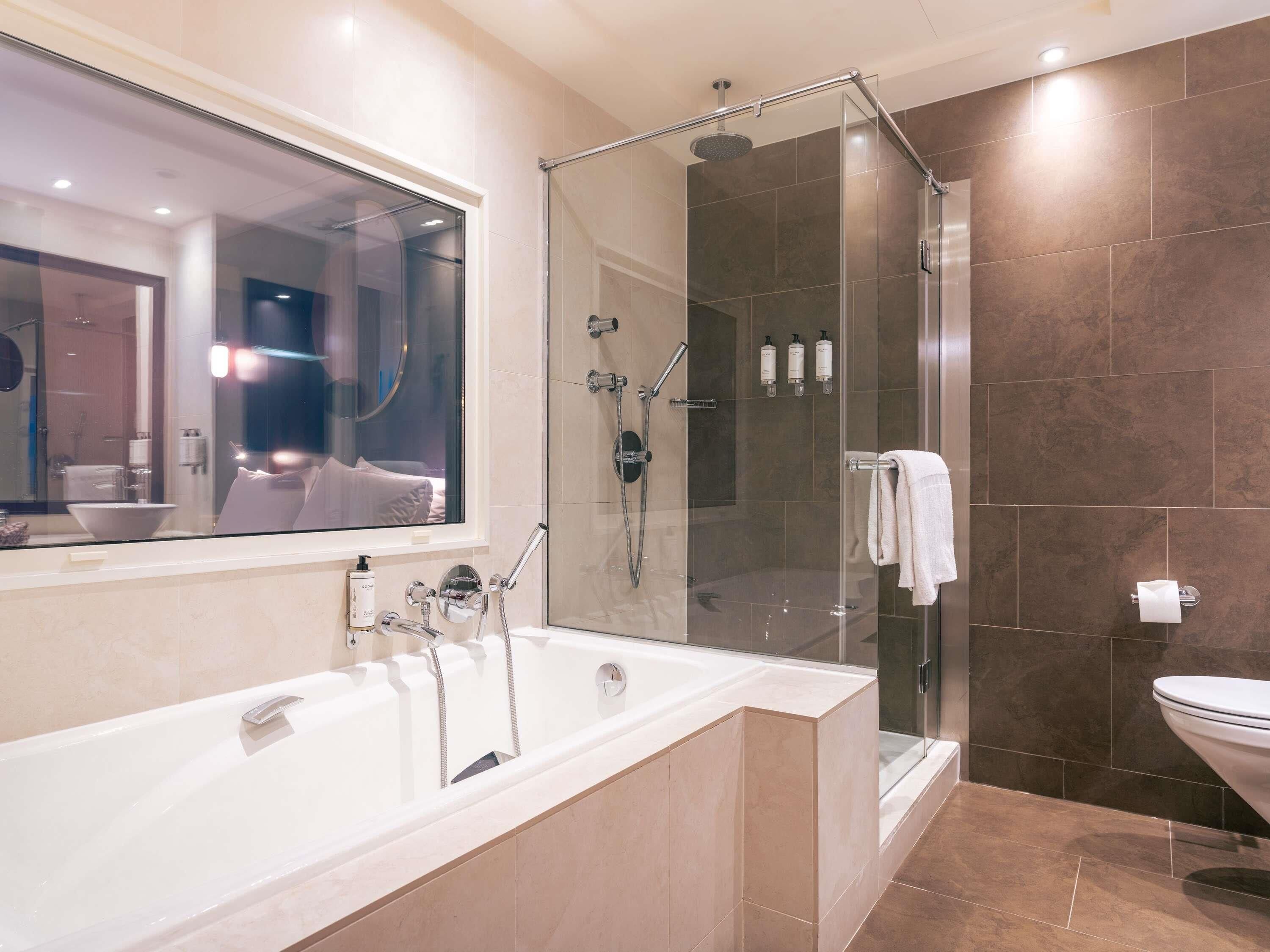 Premium bedding, pillowtop beds, minibar (some free items), in-room safe
