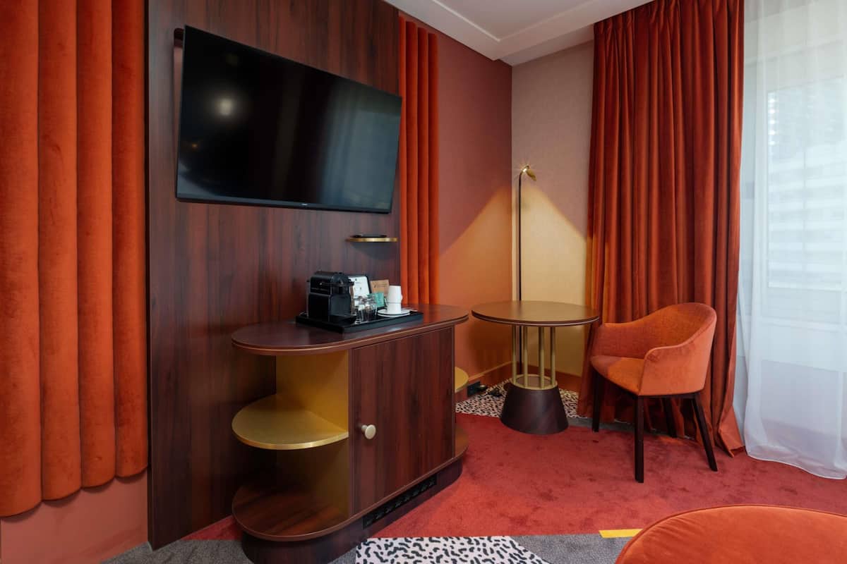 Premium bedding, pillow-top beds, free minibar items, in-room safe