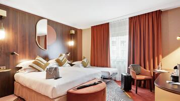 Premium bedding, pillow-top beds, free minibar items, in-room safe