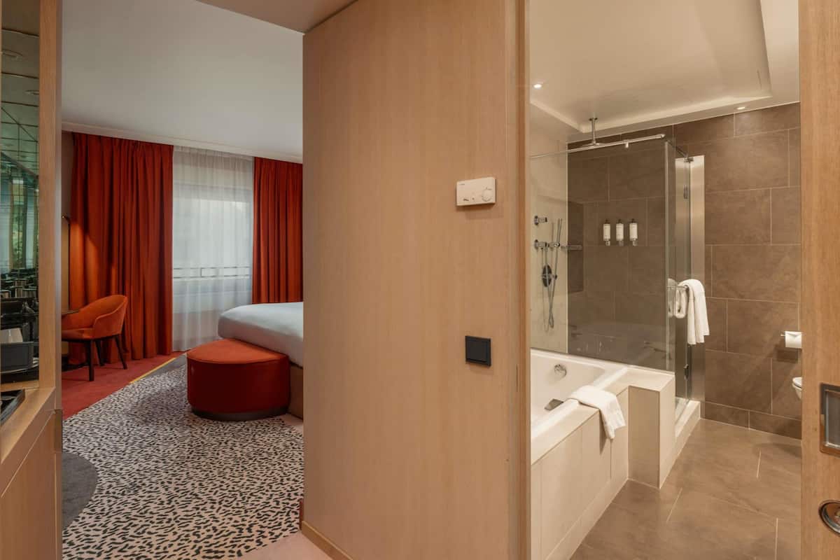 Premium bedding, pillow-top beds, free minibar items, in-room safe