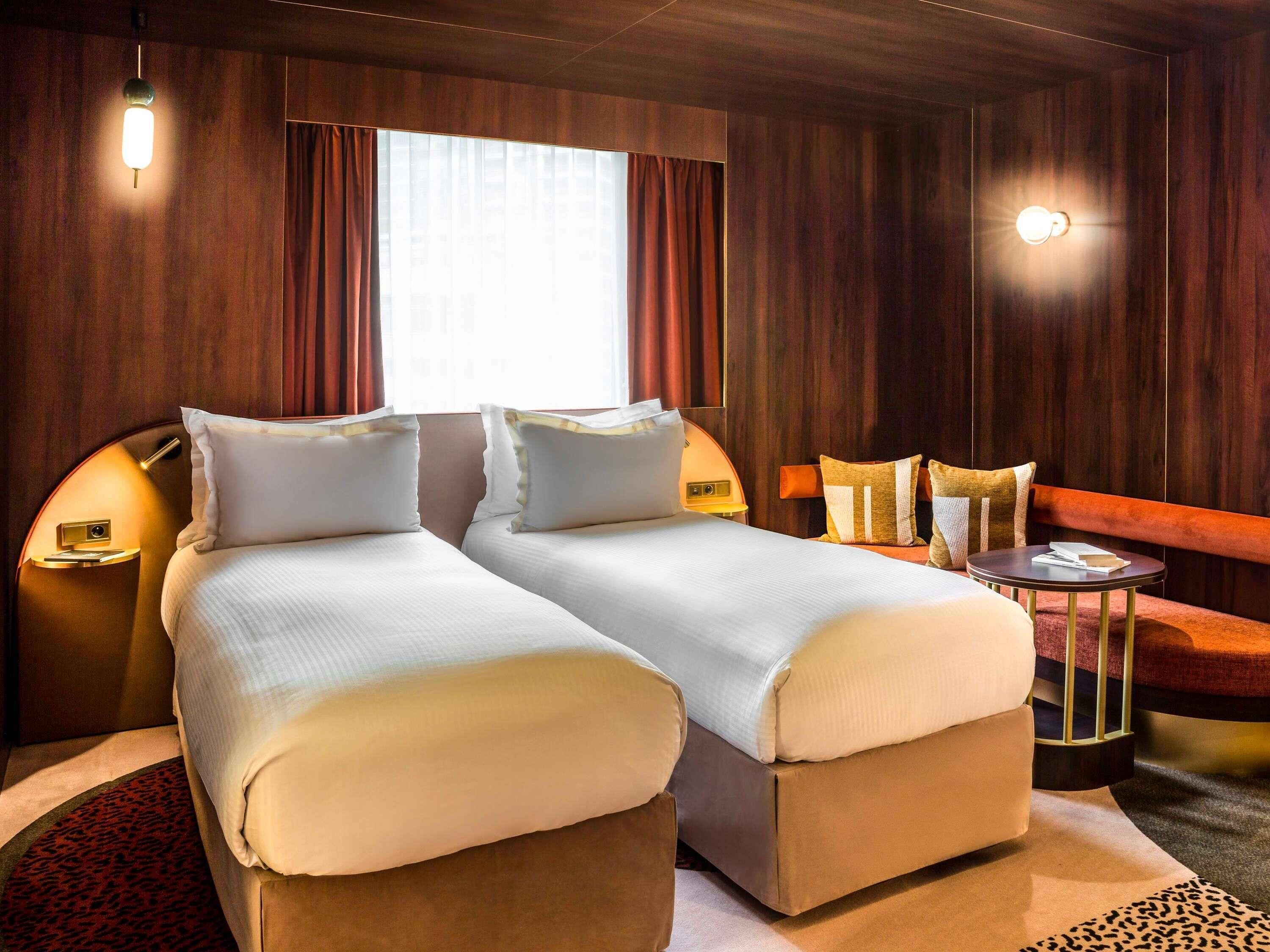 Premium bedding, pillow-top beds, free minibar items, in-room safe