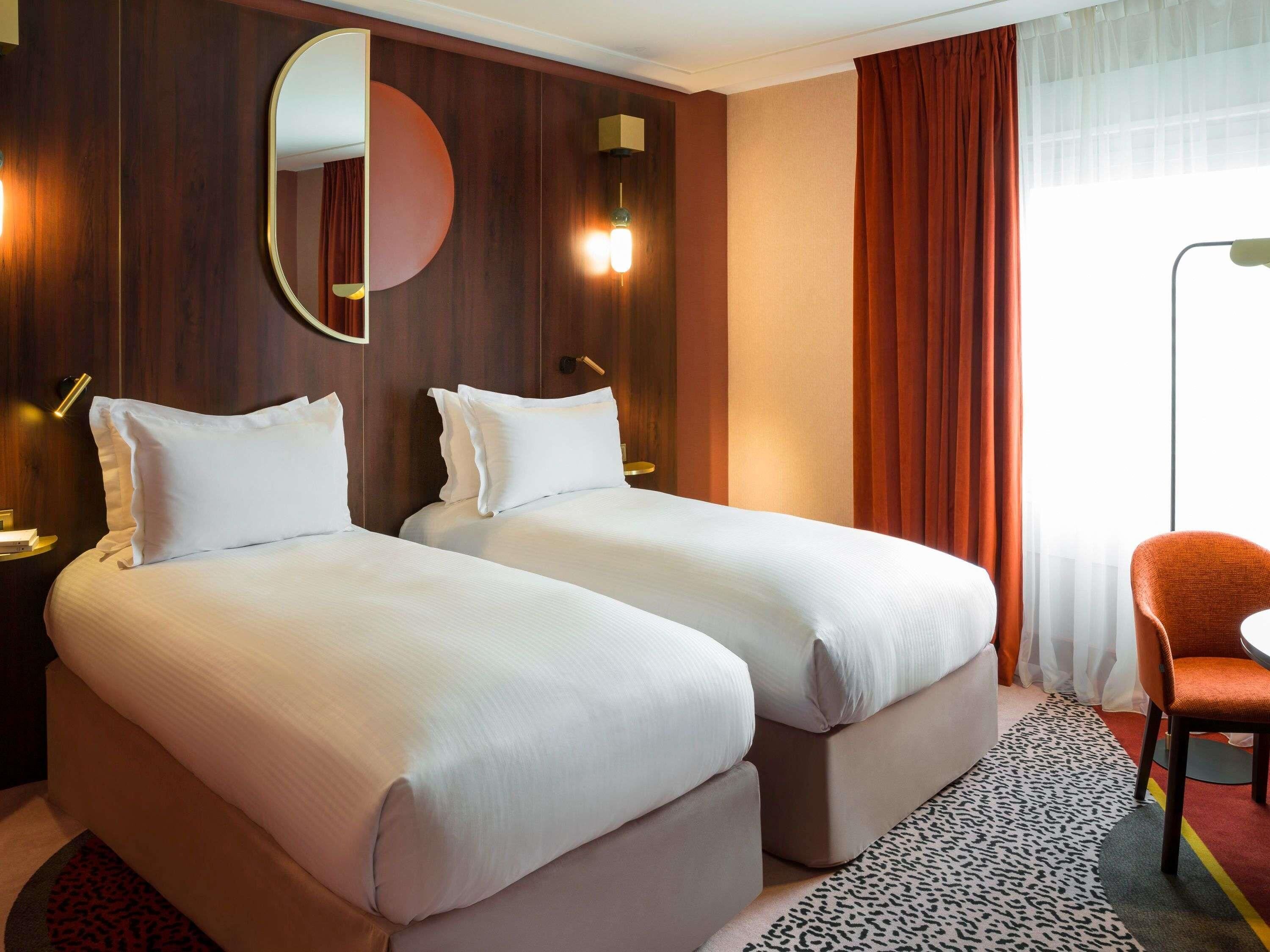 Premium bedding, pillow-top beds, free minibar items, in-room safe