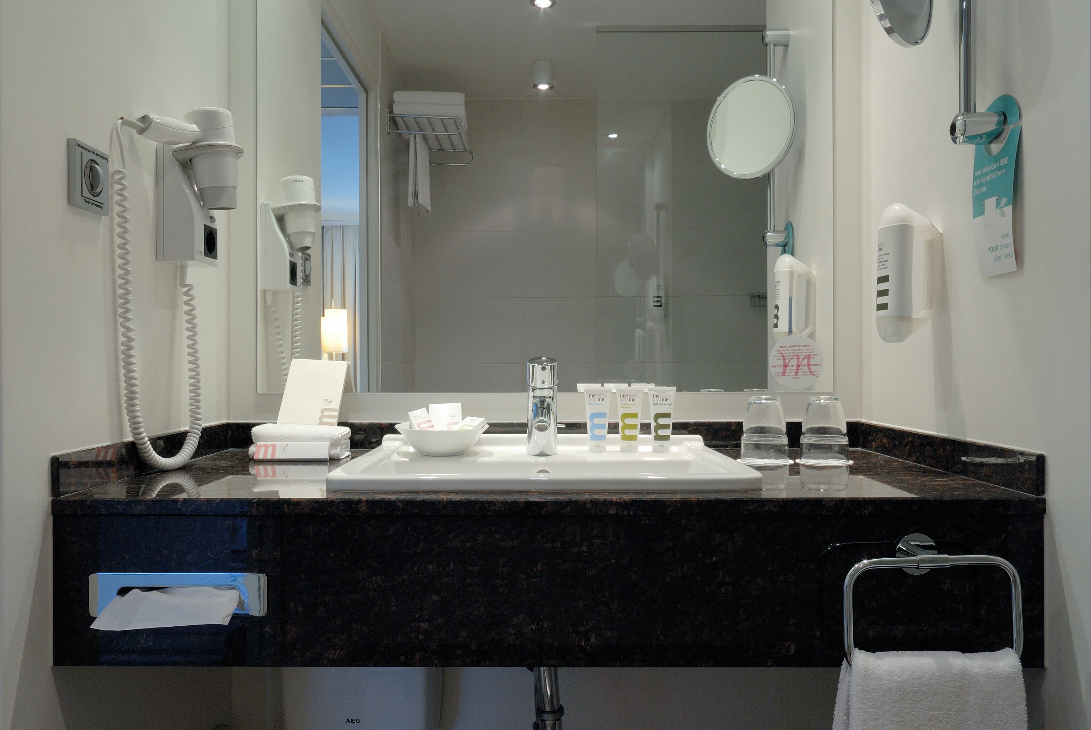 combined shower/bathtub, eco-friendly toiletries, hair dryer, bathrobes