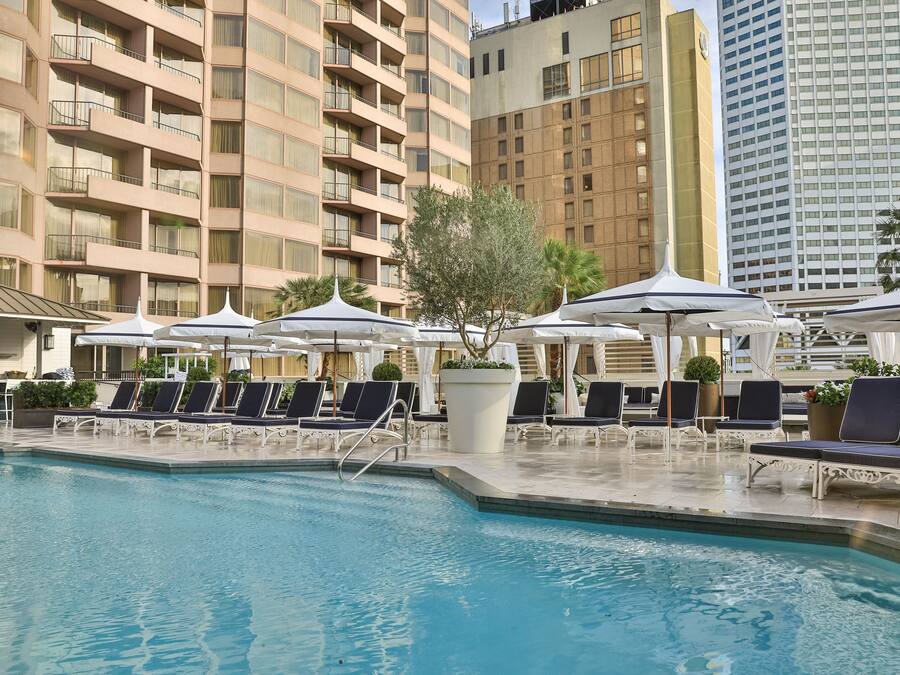 Outdoor pool, open 6:00 AM to 10:00 PM, cabanas (surcharge)