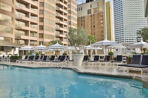 Outdoor pool, open 6:00 AM to 10:00 PM, pool cabanas (surcharge)