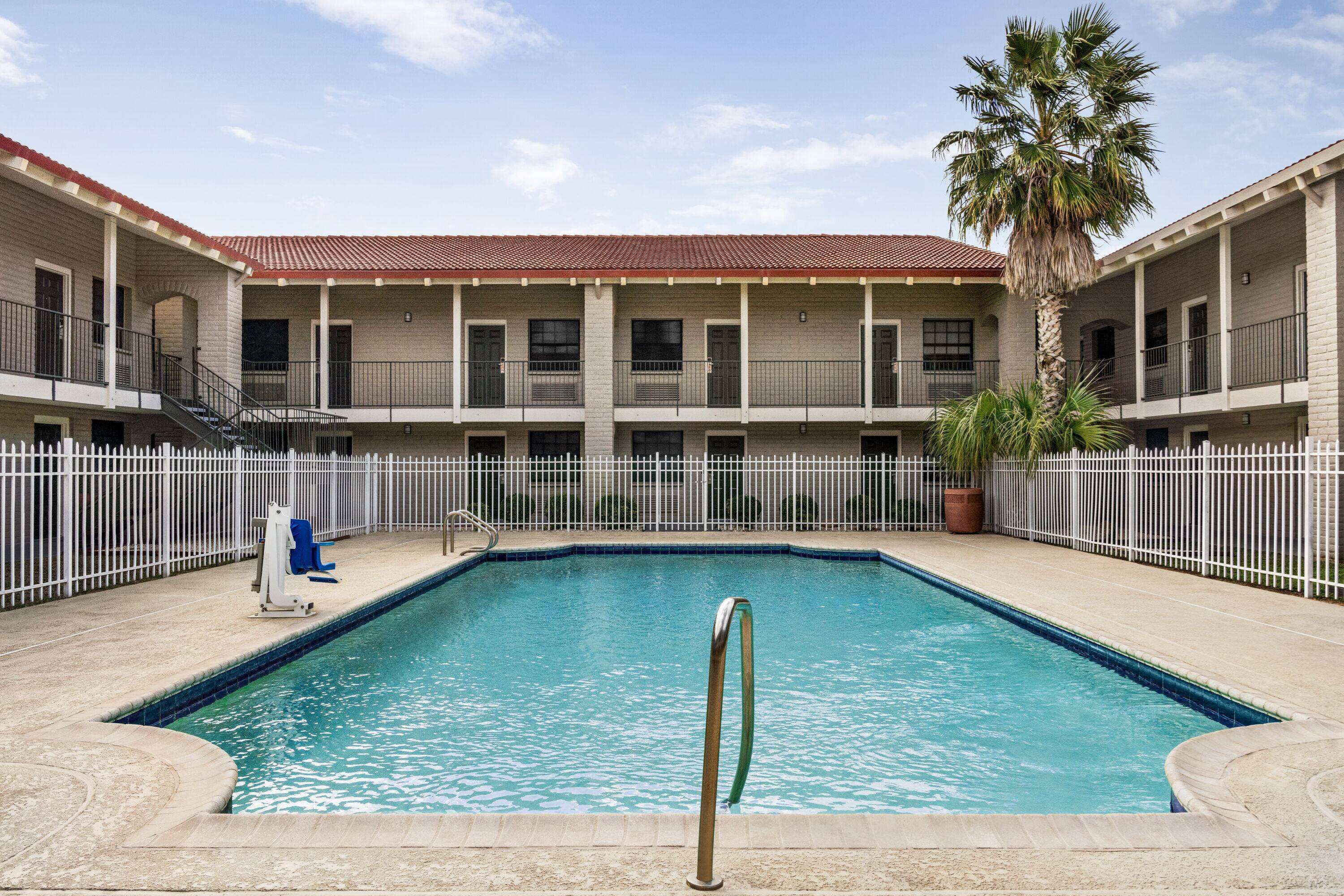 Outdoor pool, open 9:00 AM to 10:00 PM, pool umbrellas, sun loungers