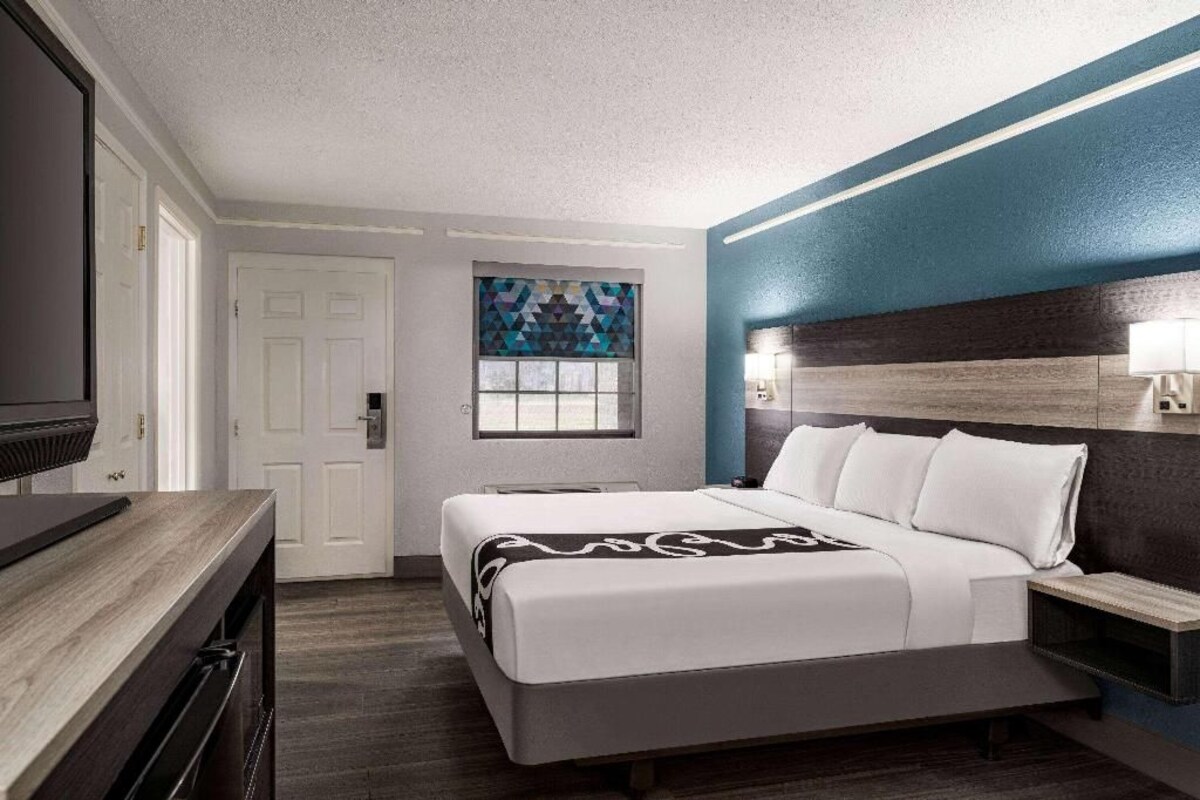 Premium bedding, pillowtop beds, desk, laptop workspace