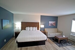 Suíte, 1 cama King, para não fumantes | Roupas de cama premium, escrivaninha, espaço de trabalho para notebook