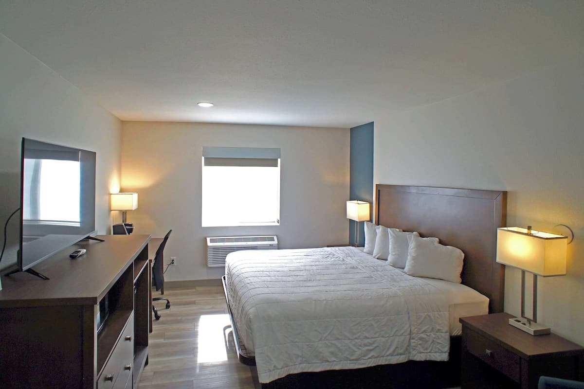 Room, 1 King Bed, Mobility Accessible, Non Smoking (Mobility, Roll-in Shower) | Premium bedding, desk, laptop workspace, blackout drapes