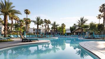 2 outdoor pools, open 8:00 AM to 10:00 PM, pool cabanas (surcharge)