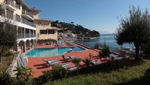 Outdoor pool, a rooftop pool, sun loungers