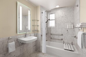 Designer toiletries, hair dryer, towels, soap