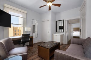 Suite, 1 King Bed, Non Smoking, Refrigerator | Pillowtop beds, desk, laptop workspace, blackout drapes