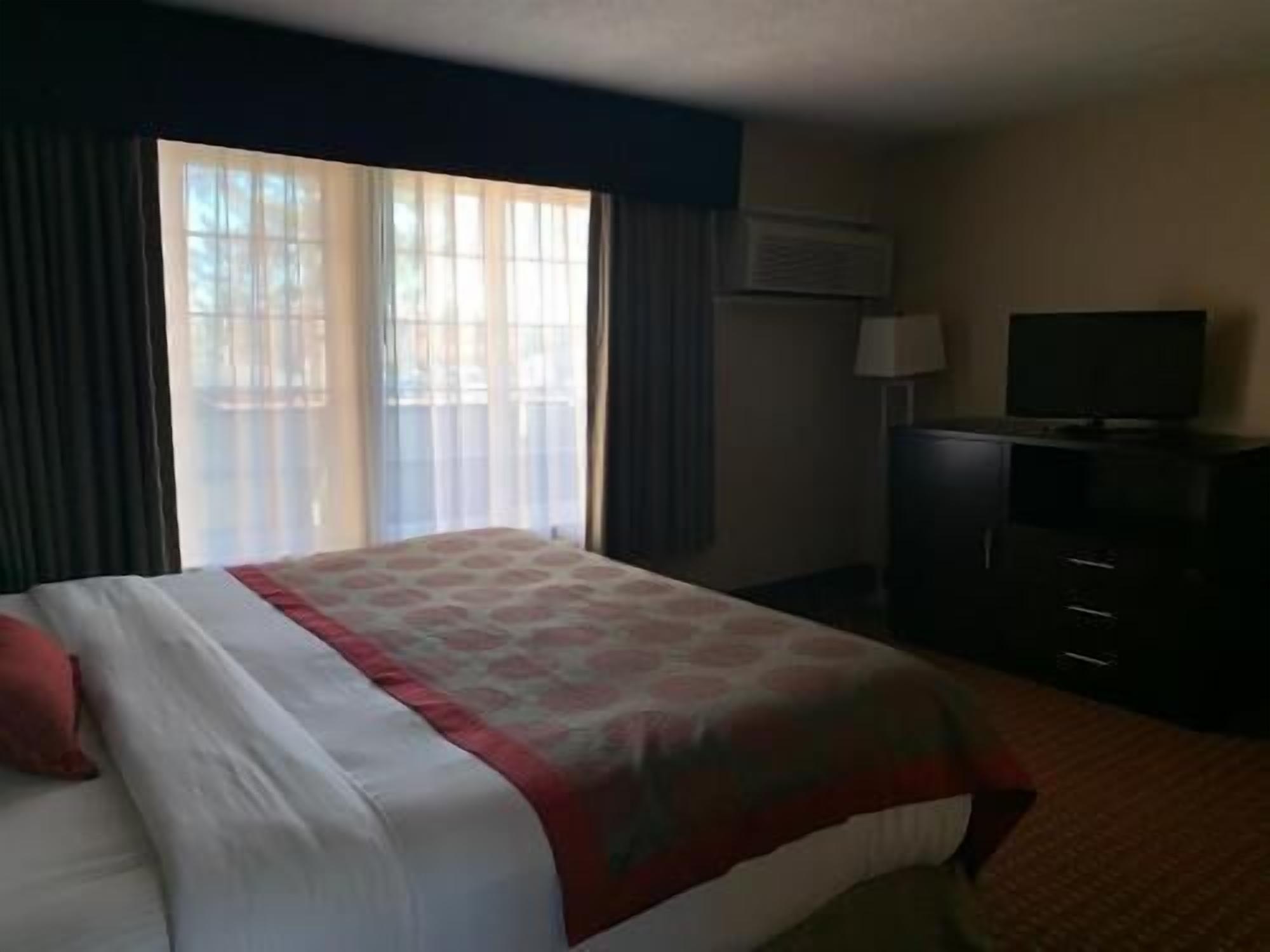 Premium bedding, down comforters, pillowtop beds, desk