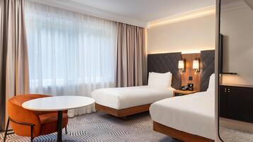 Ropa de cama de alta calidad y minibar