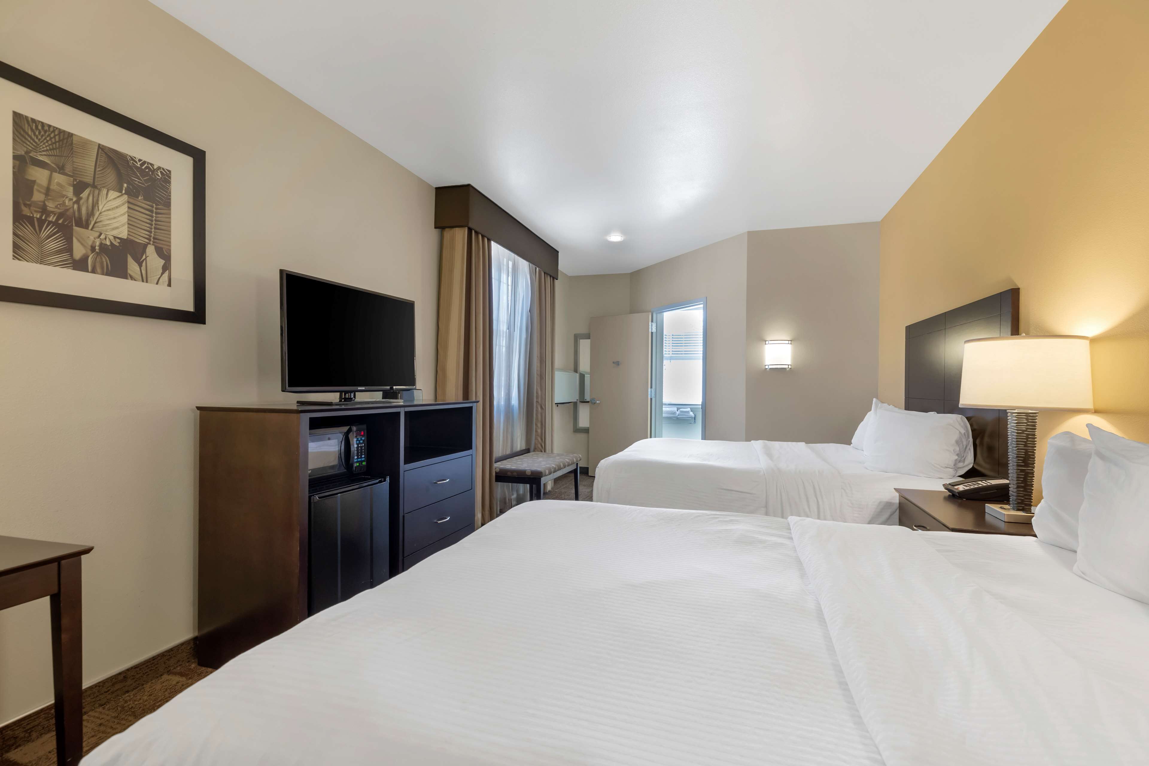 standard room, 2 queen beds, accessible, non smoking | desk, laptop workspace, iron/ironing board, free cots/infant beds