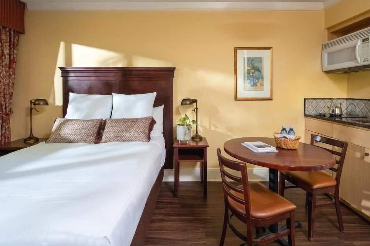 Desk, blackout drapes, WiFi (free), bed sheets