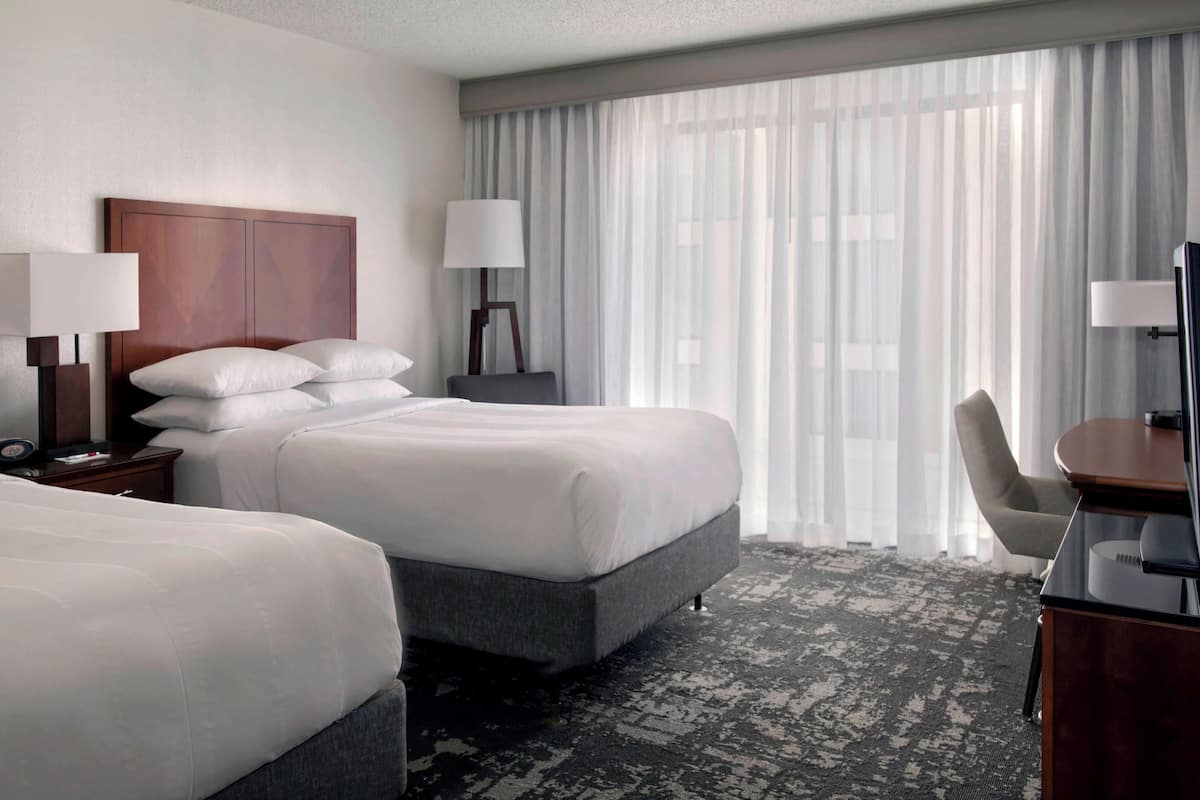 Premium bedding, desk, laptop workspace, iron/ironing board