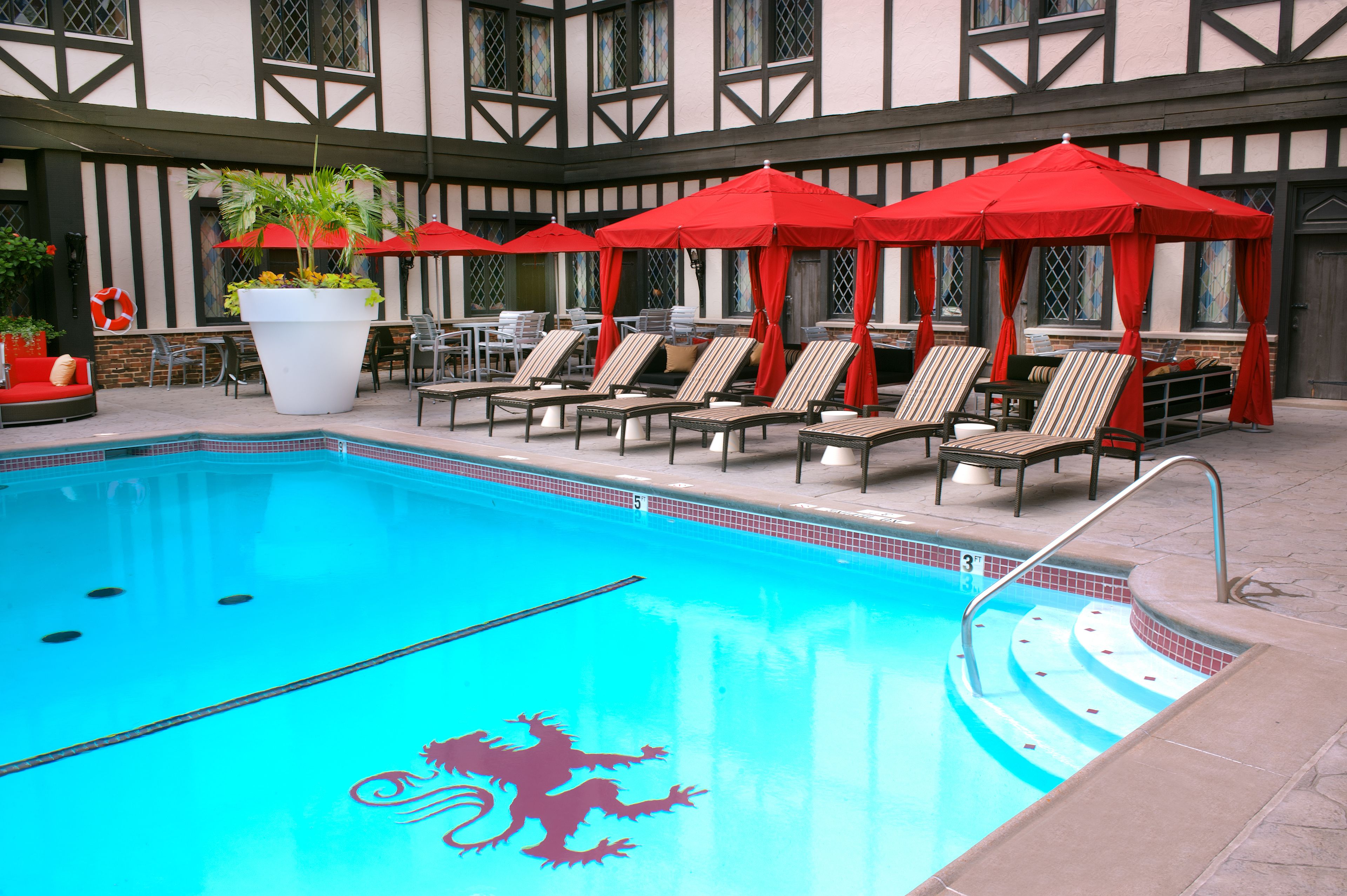 Seasonal outdoor pool, open 10:00 AM to 10:00 PM, free pool cabanas