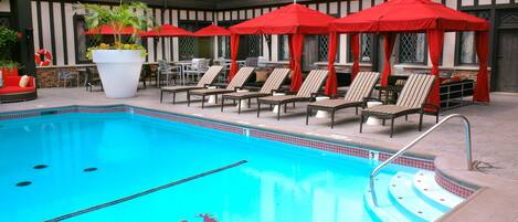 Seasonal outdoor pool, open 10:00 AM to 10:00 PM, free cabanas