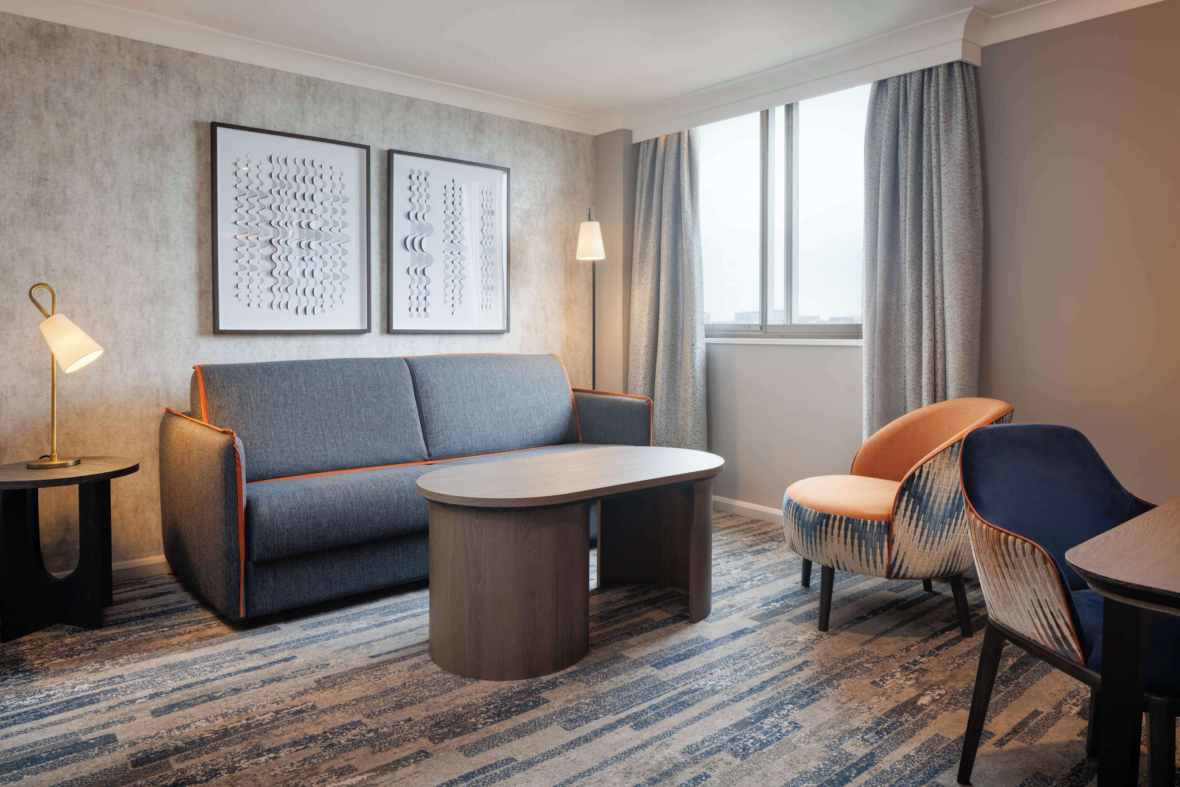 Premium Suite | Living area | 32-inch plasma TV with cable channels, TV