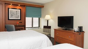 Premium bedding, desk, laptop workspace, blackout curtains