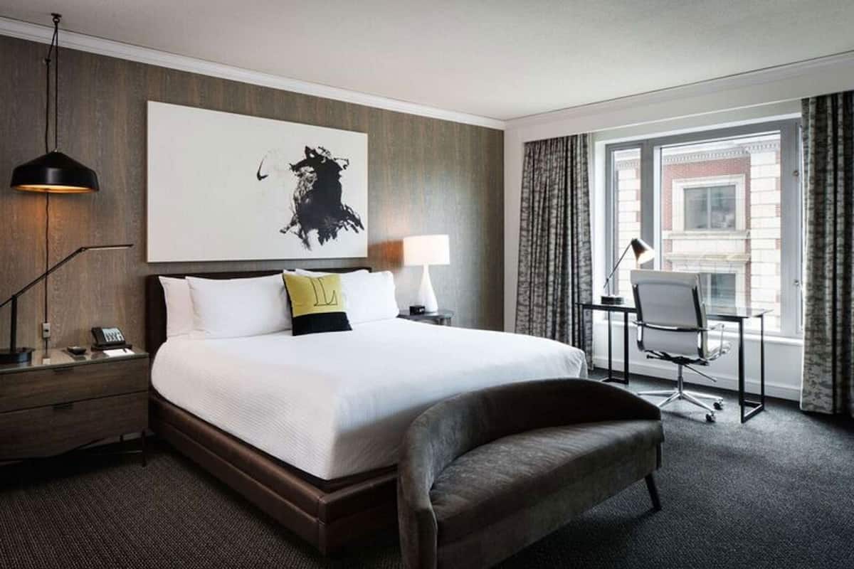 Premium bedding, down comforters, pillowtop beds, in-room safe