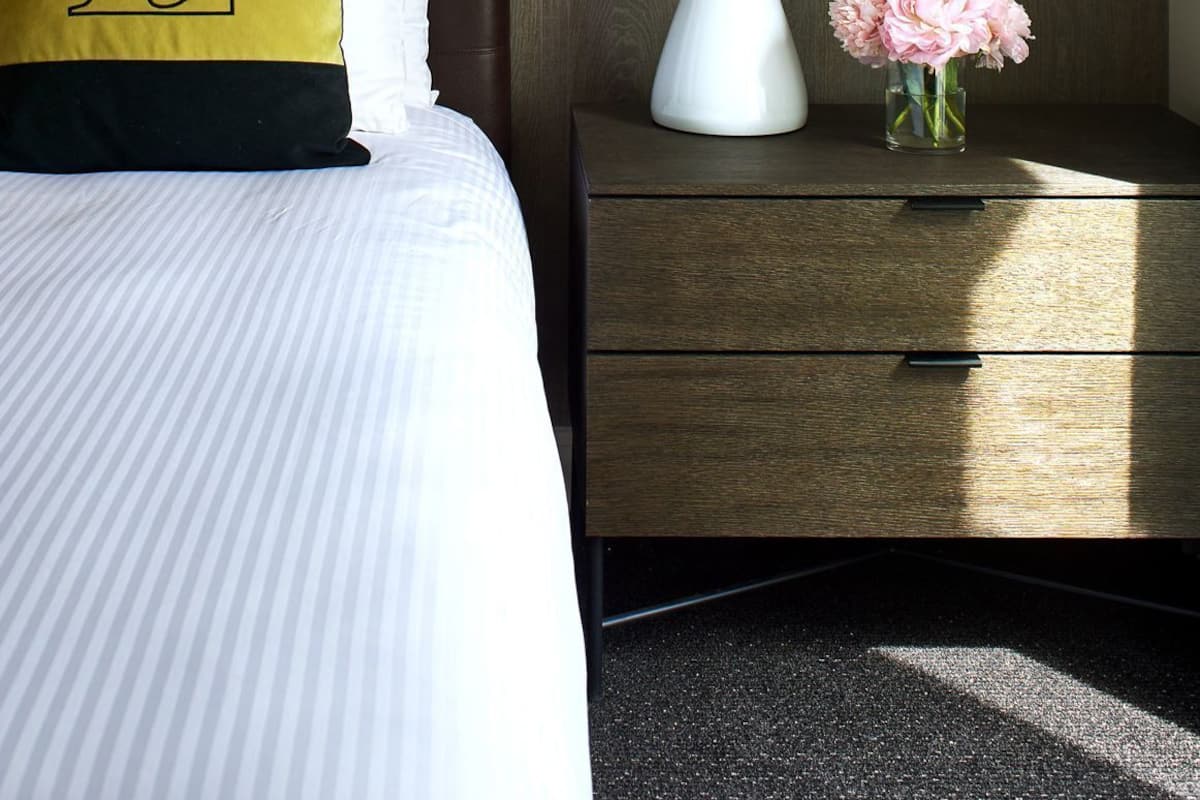 Premium bedding, down comforters, pillowtop beds, in-room safe