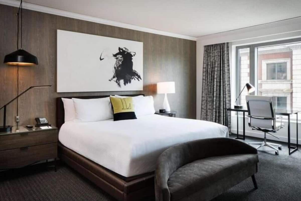 Premium bedding, down comforters, pillowtop beds, in-room safe