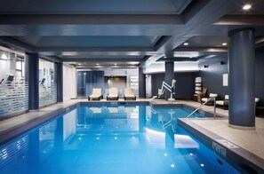 Indoor pool, open 8:00 AM to 11:00 PM, pool loungers