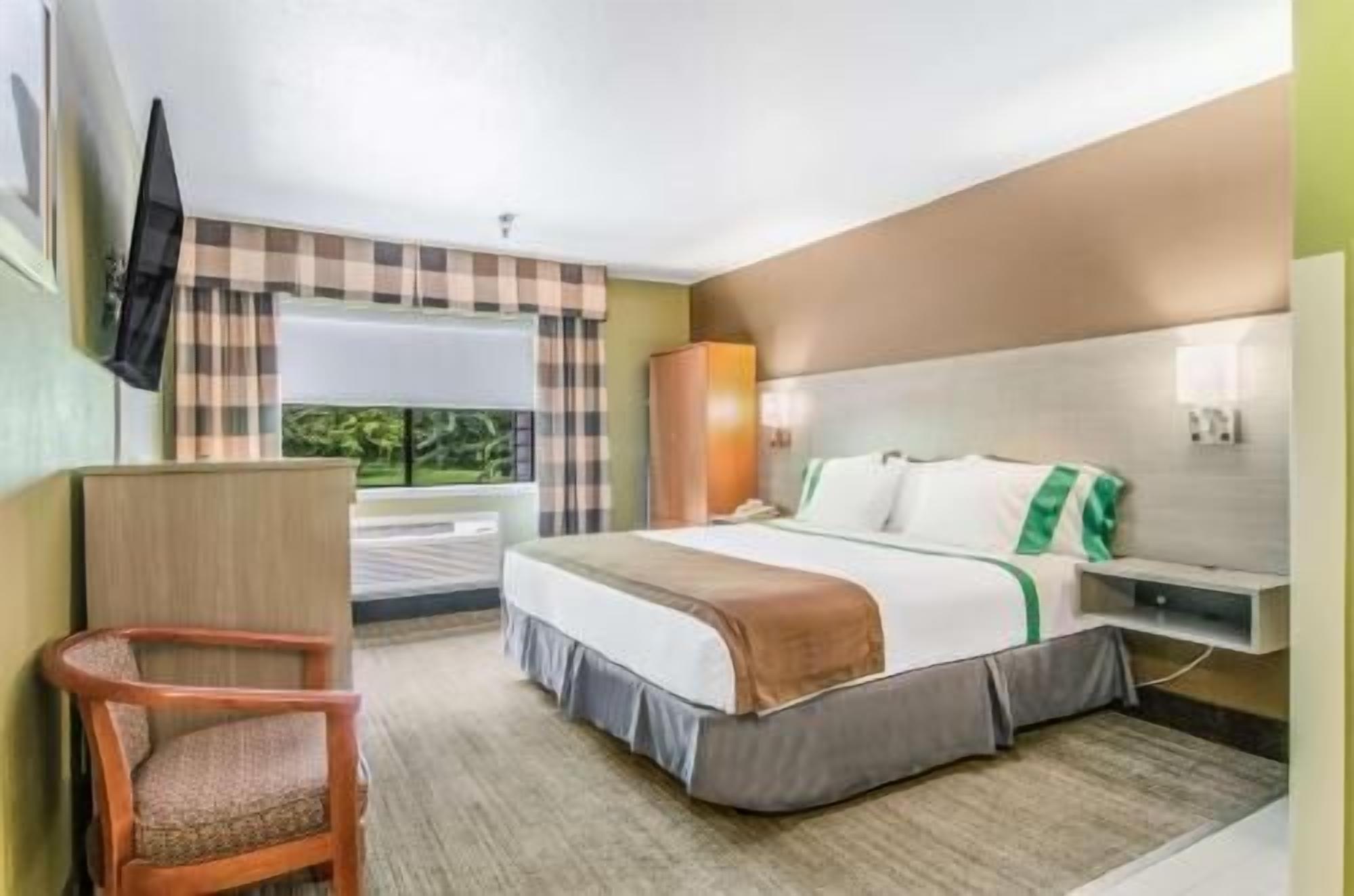 Premium bedding, down duvets, pillow-top beds, in-room safe