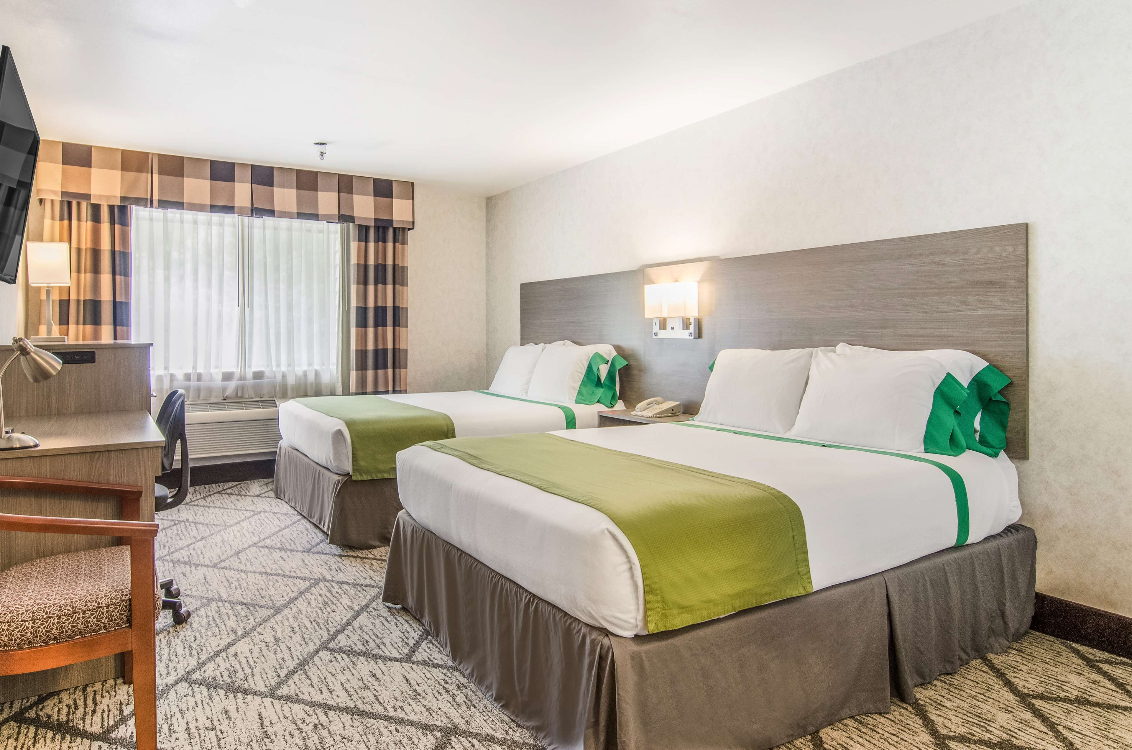 deluxe room, 2 queen beds | premium bedding, down duvets, pillow-top beds, in-room safe