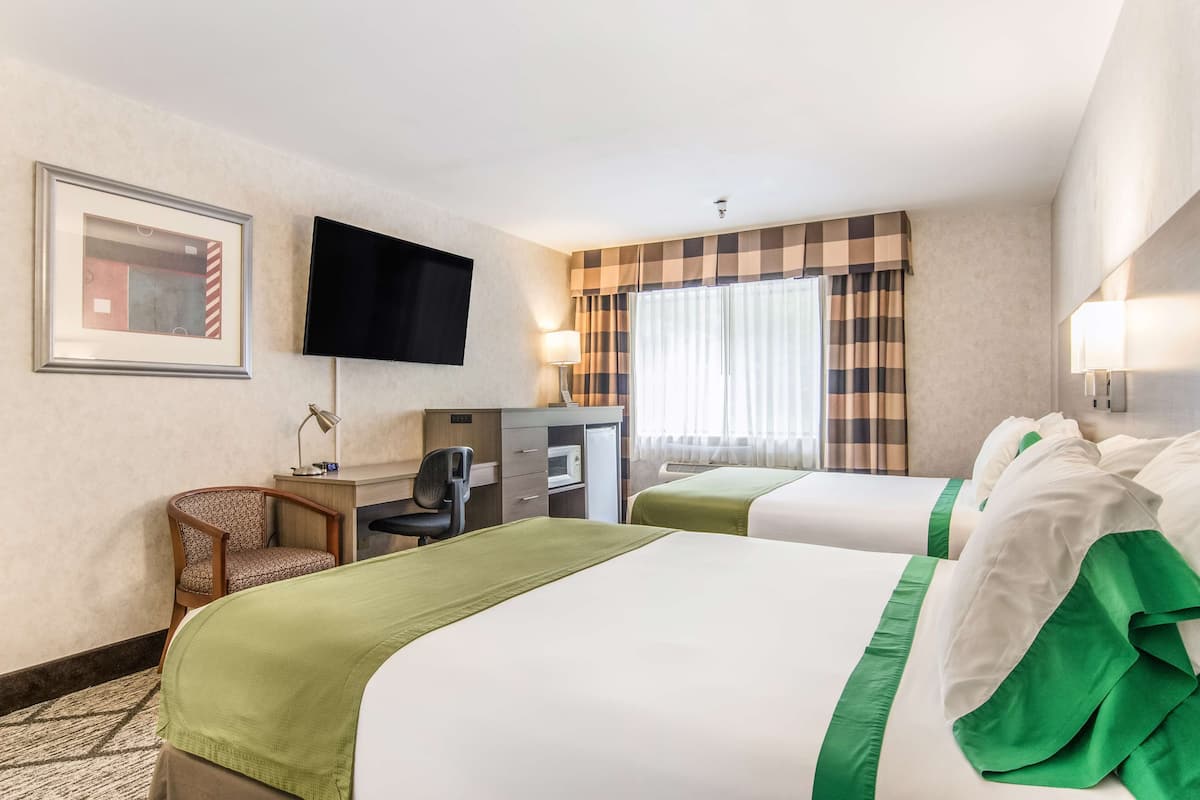 Premium bedding, down duvets, pillow-top beds, in-room safe