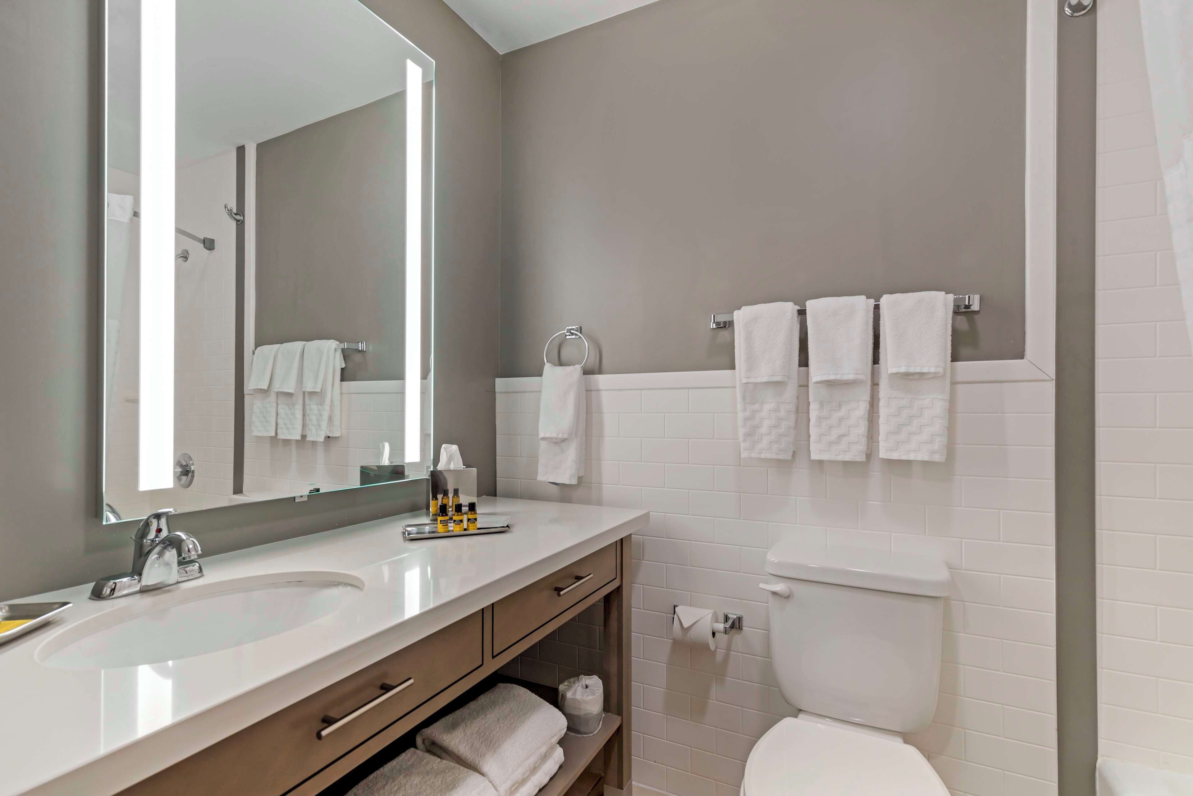 standard room, 2 queen beds, non smoking, refrigerator & microwave | bathroom | combined shower/bathtub, free toiletries, hair dryer, towels