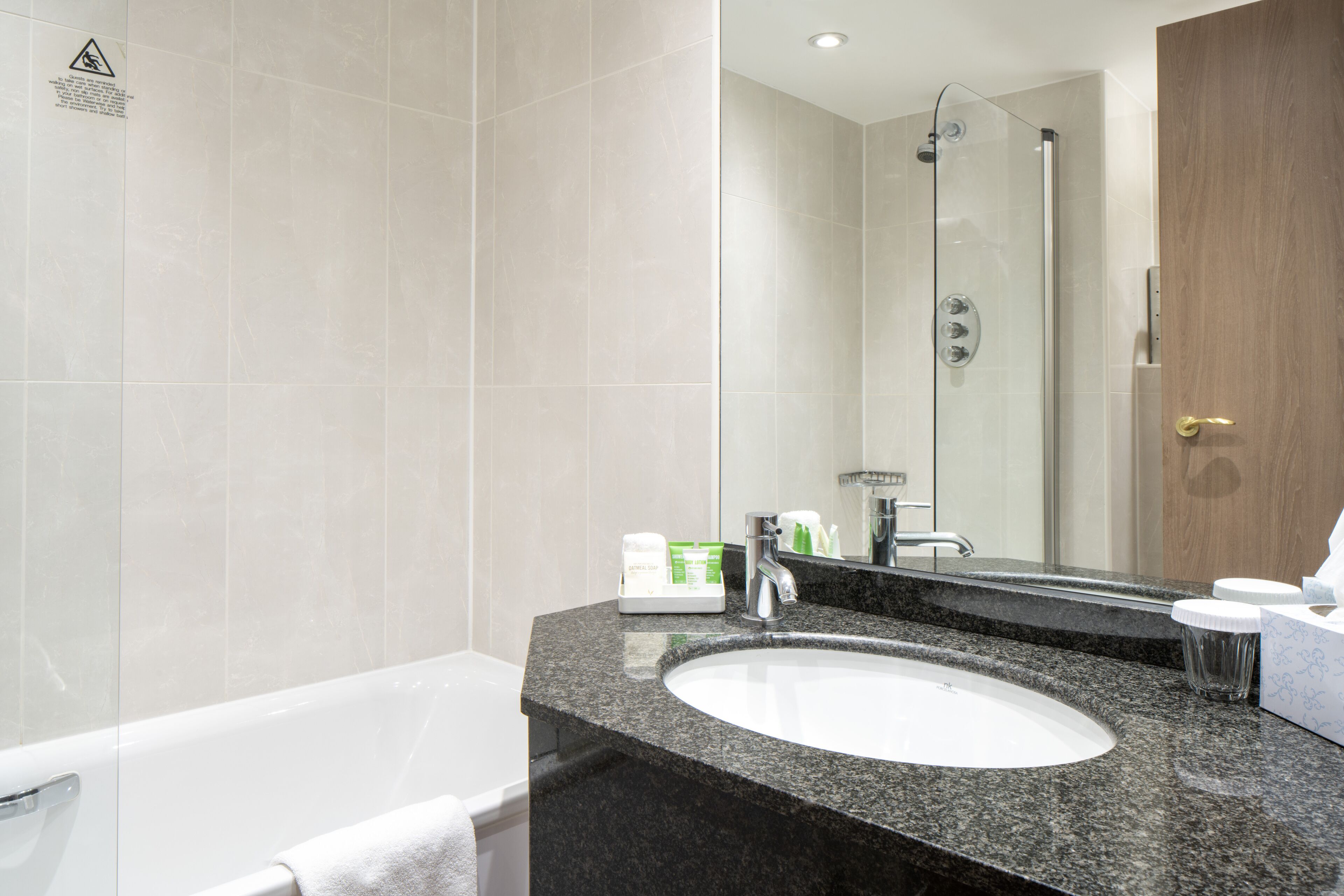 combined shower/bathtub, free toiletries, hair dryer, towels