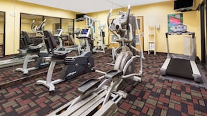 A gym with treadmills, elliptical machines, and a stationary bike. - Ramada by Wyndham Kent Seattle Area (Kent)