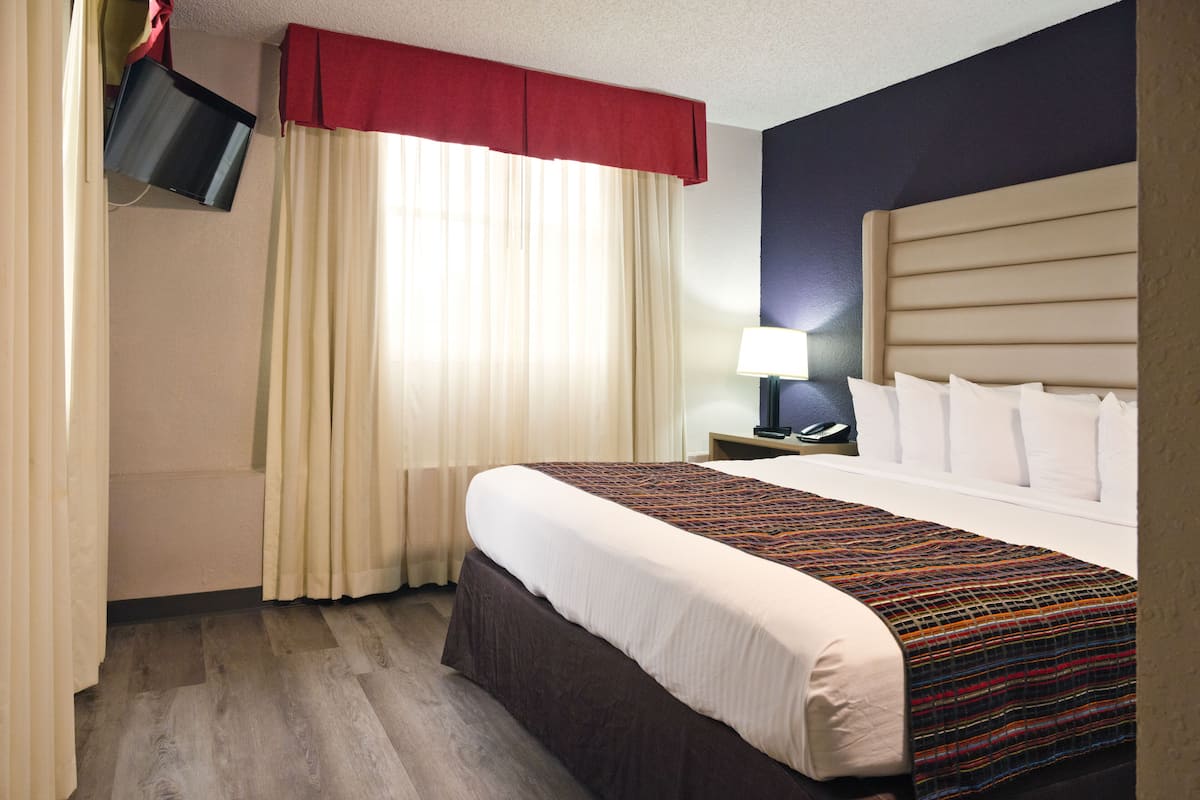 Studio Suite, 1 King Bed | 1 bedroom, in-room safe, desk, blackout drapes