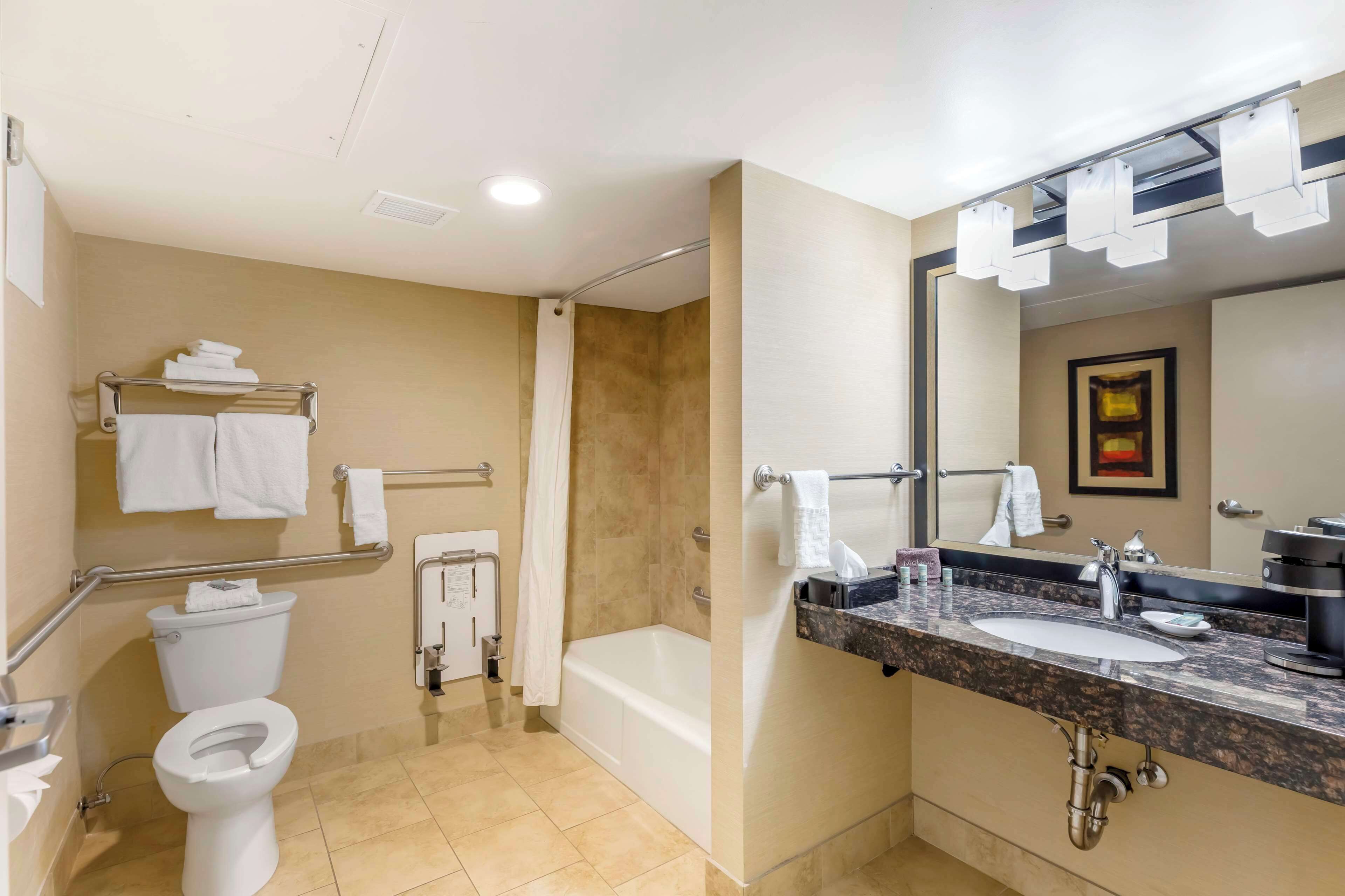 combined shower/bathtub, deep-soaking bathtub, rainfall showerhead