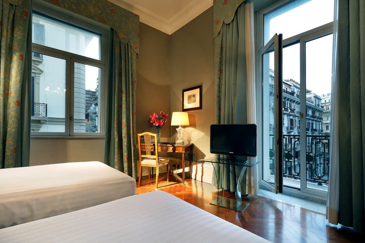 Premium bedding, down comforters, minibar, in-room safe