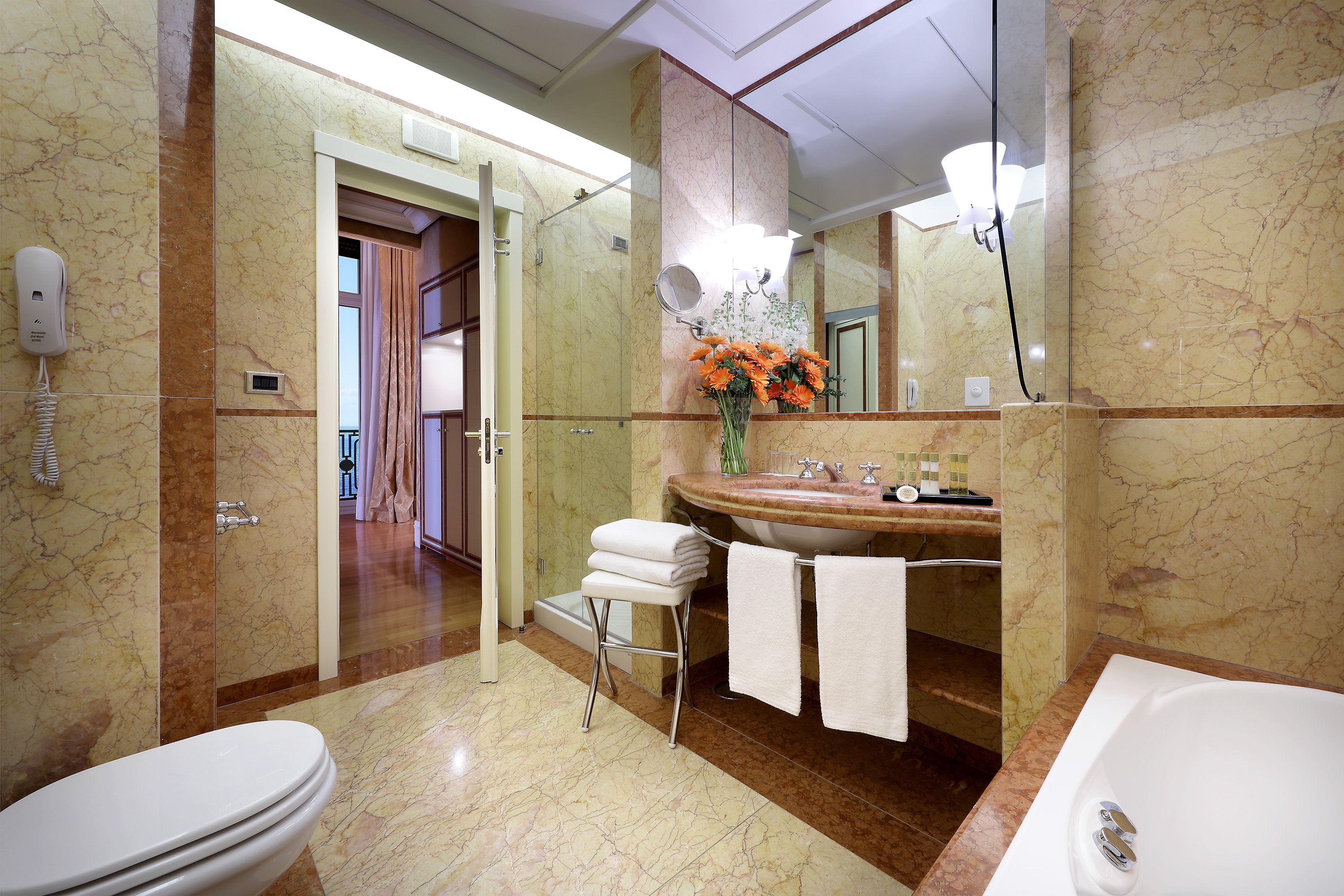 eco-friendly toiletries, bidet, towels