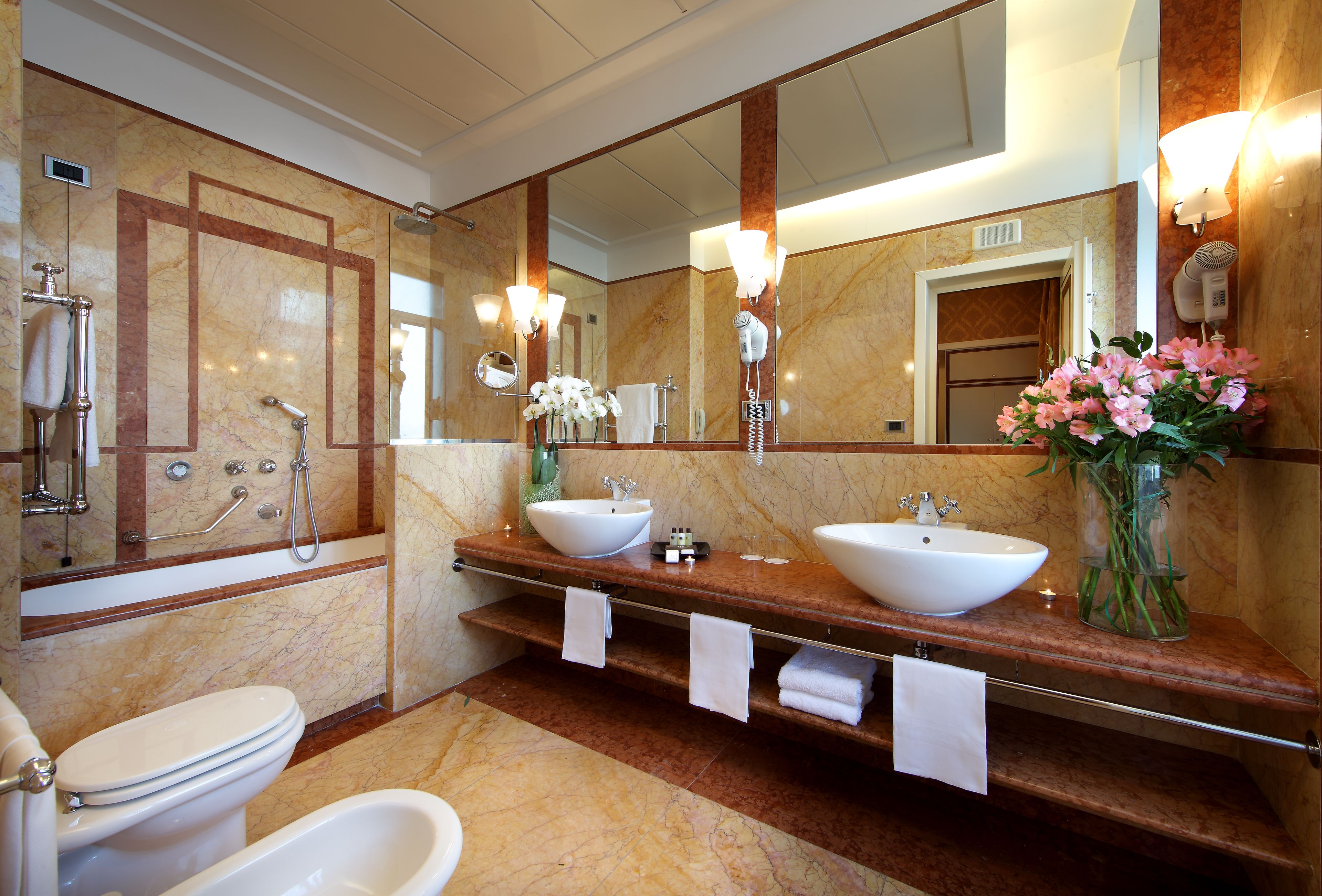 eco-friendly toiletries, bidet, towels